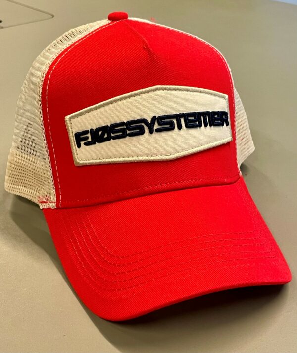 Fjøssystemer caps